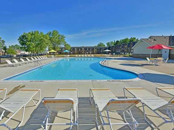 Large Outdoor Pool and Sundeck at Windsor Place apartments in Davison, Michigan