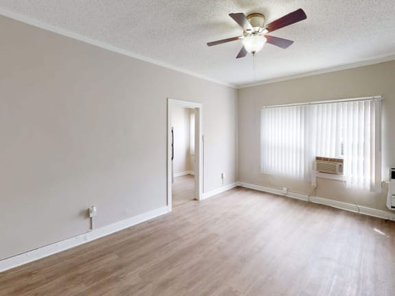 Living Room with Air Conditioning Unit at Hobart Apartments, California, 90029