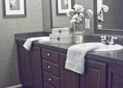 Thumbnail 6 of 11 - Master Bathroom Sink at Pine Village Rental Home Community in Sanford, NC