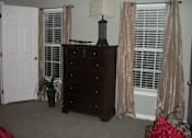 Thumbnail 9 of 11 - Master Bedroom at Pine Village Rental Home Community in Sanford, NC