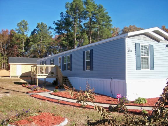 Property Exterior at Pine Village Rental Home Community in Sanford, NC