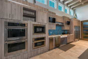 Thumbnail 50 of 80 - Clubhouse Kitchen at Centre Pointe Apartments in Melbourne, FL