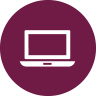 a laptop computer sitting on top of a purple