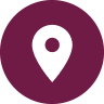 A white location pin icon on a dark purple background.