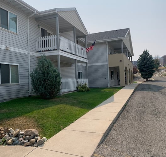 exterior building with sidewalk at EAST PARK VILLAS Apartments, HELENA, 59601