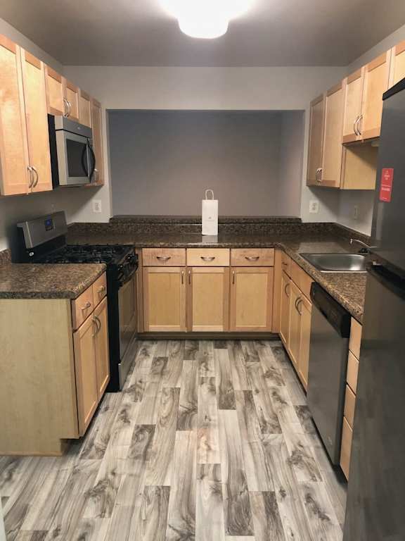 Modern Kitchen With Custom Cabinet at The Apartments at Wellington Trace, Frederick, Maryland