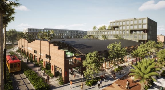 an artist impression of a redeveloped city centre with a train station  at La Unión, Tampa, FL, 33605
