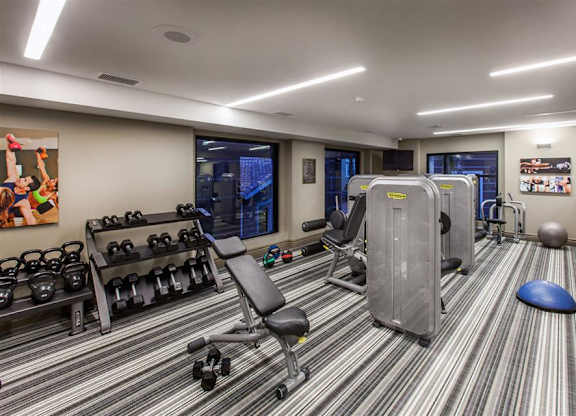 The Verdant Apartments fitness center with free weights in San Jose CA