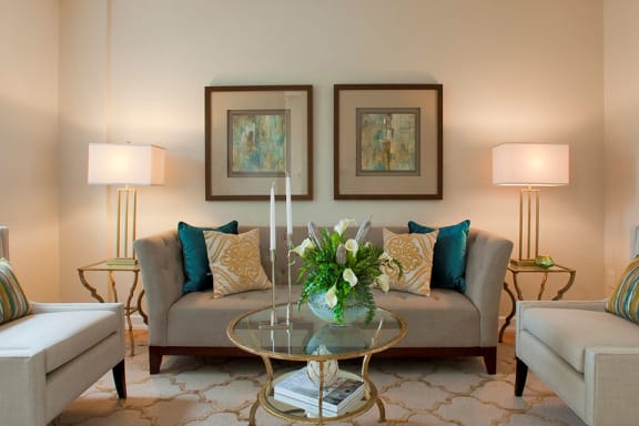 a living room with a couch and a table