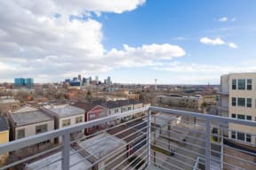 Balcony view of Denver skyline from 2828 Zuni Apartments