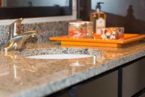 Granite counter tops in Bathroom | 2828 Zuni Apartments