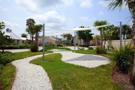 Walking paths and shaded areas at Coral Club, Bradenton, Florida
