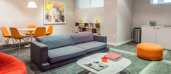 a living room with a couch and a coffee table
