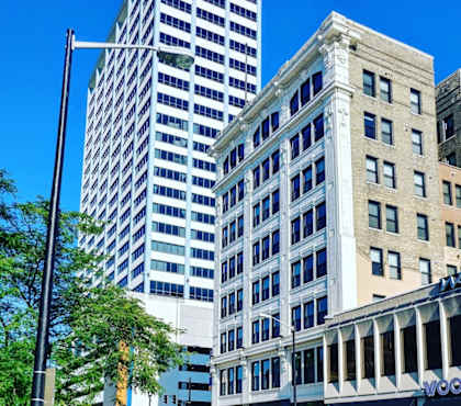 a tall building with a street in front of it at Studebaker Lofts, South Bend, IN, 46601