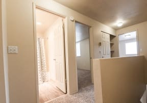 Lakewood Apartments - Southern Pines Apartments - Second Floor Landing, Bathroom, Hall Closet, and Bedrooms