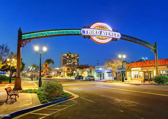 Street view of Third Avenue at night at Casa Estilo Apartments, Chula Vista