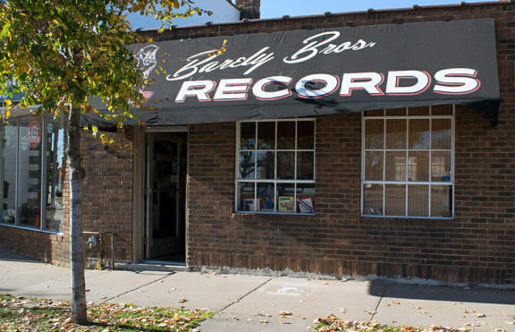 a brick building with a sign that says berry bros records