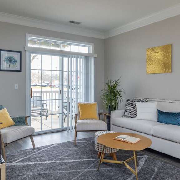 a living room with a couch and a table