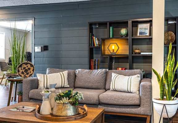 a living room with a couch and a coffee table