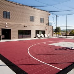 a basketball court on the roof of a building
