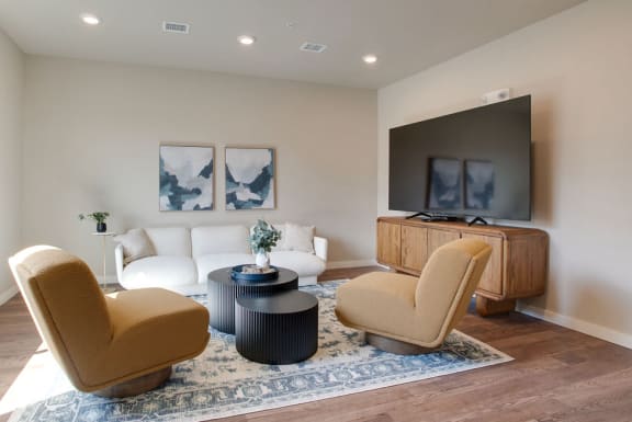 a kitchen with dark wood cabinets and a white counter top at Pinehurst Apartments, Baxter