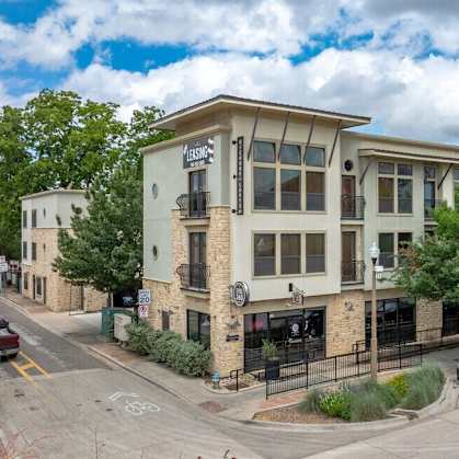 A building with a sign that says  at Hickory Street Lofts Apartments, Denton, TX, 76201