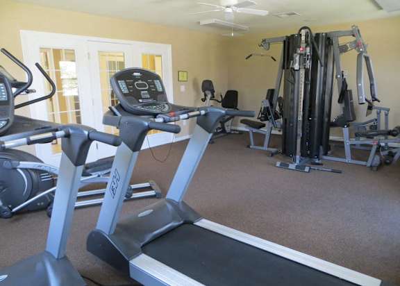A room with fitness equipment.