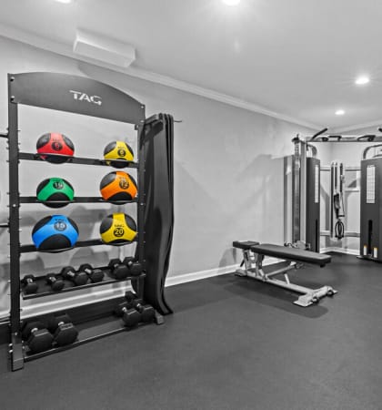 a home gym with weights and equipment