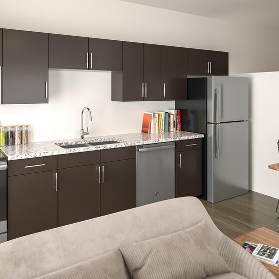 A modern kitchen with dark brown cabinets and stainless steel appliances.