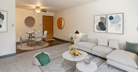 a living room with a couch and a table