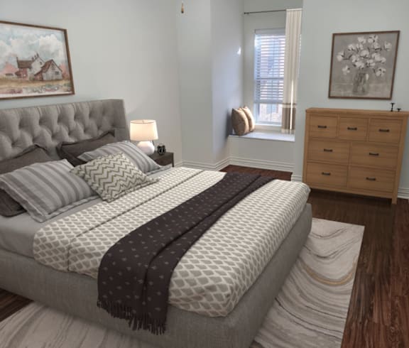 a bedroom with a bed and a dresser and a window