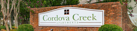 cordova creek apartments in front of flowers