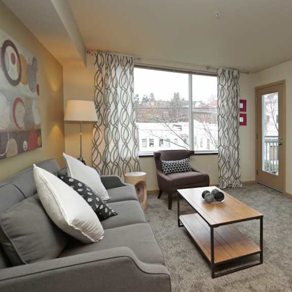 living room with access to private balcony