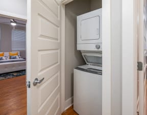 a laundry room with a washer and dryer in a closet