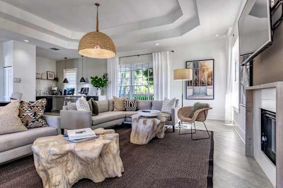 a kitchen with stainless steel appliances and white cabinets
