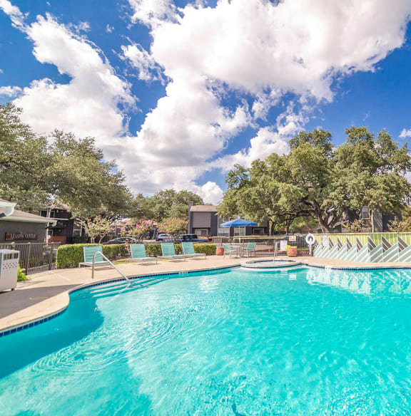 view of pool and lounge chairs