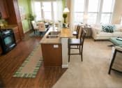 Thumbnail 10 of 23 - kitchen and living room at VistaView apartments in Frederick, MD