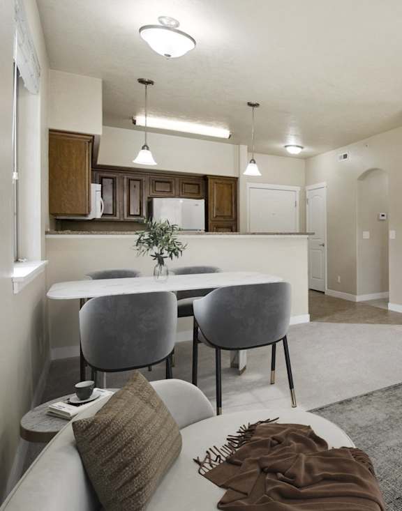 Living room with ceiling fan at Siena Villas Apartments, Orem, UT