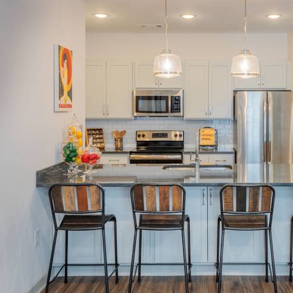 Kitchen with Island at Riverside Flats at Aberfoyle Village, Belmont, 28012