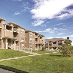 exterior view and lush green landscaping at The Preserve at Rock Springs in Rock Springs, Wyoming 82901