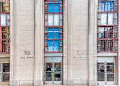Thumbnail 3 of 74 - A building with the sign