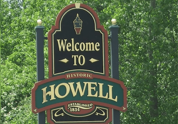 a building with a large neon sign on the front of it