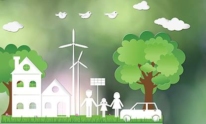 A family is standing in front of a house with a tree and a windmill in the background.