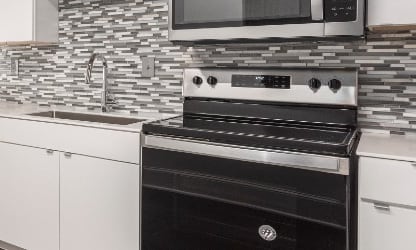 a kitchen with a stove and a dishwasher