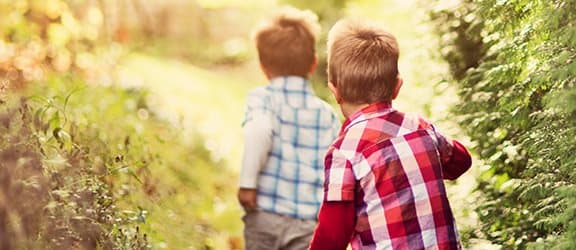 Two children playing outside