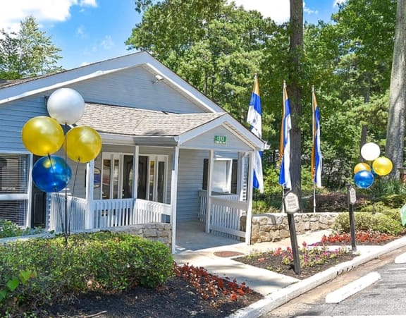 a blue house with balloons in front of it at Tucker Square, Georgia, 30083