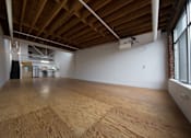 Thumbnail 5 of 11 - Un-staged Loft Unit: Living Area