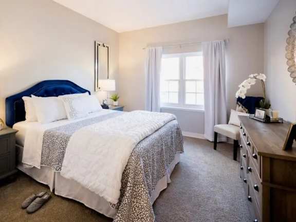 Bedroom with bed and nightstand at Hanover Place, Tinley Park, IL, 60477