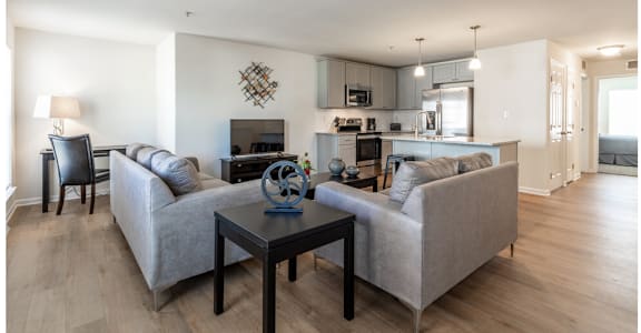 a living room with a couch and a table