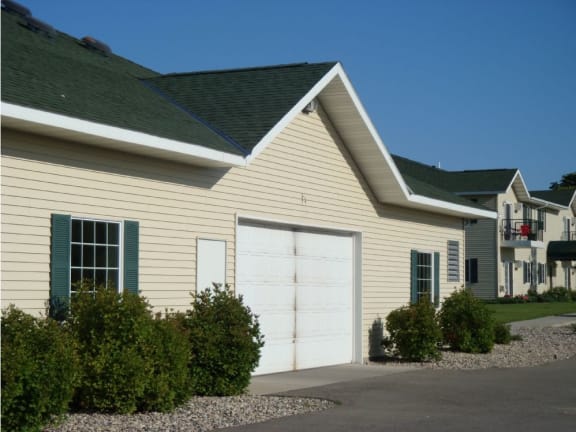 a house with a white garage door